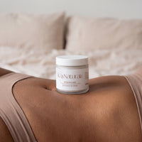 Detox Clay Mask jar in a bedroom setting