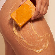 Organic Turmeric Soap Bar lathered on skin