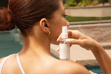 Woman holding Glow Toner by pool