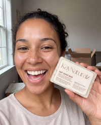 Customer smiling with her Oat Soap Bar